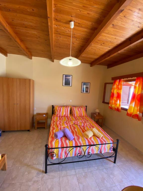 Postel nebo postele na pokoji v ubytování Gavdos Panorama