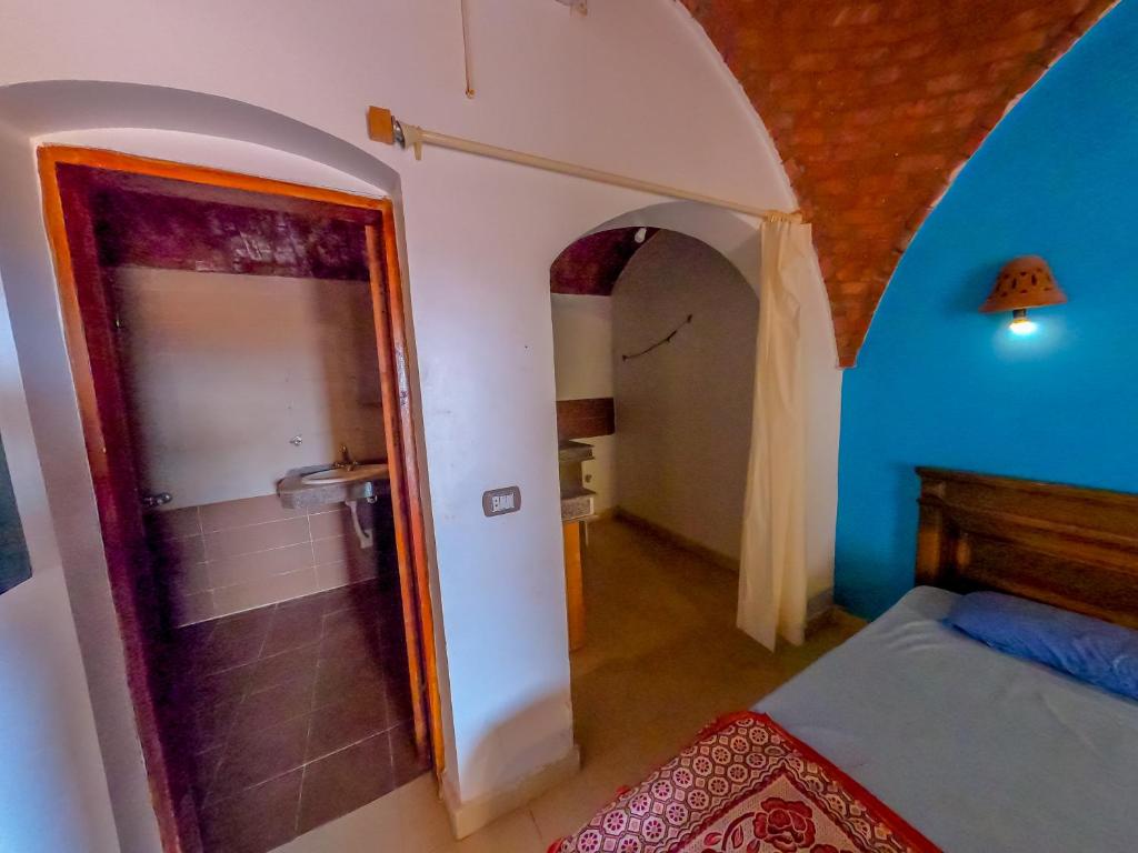 Postel nebo postele na pokoji v ubytování Baraka Camp