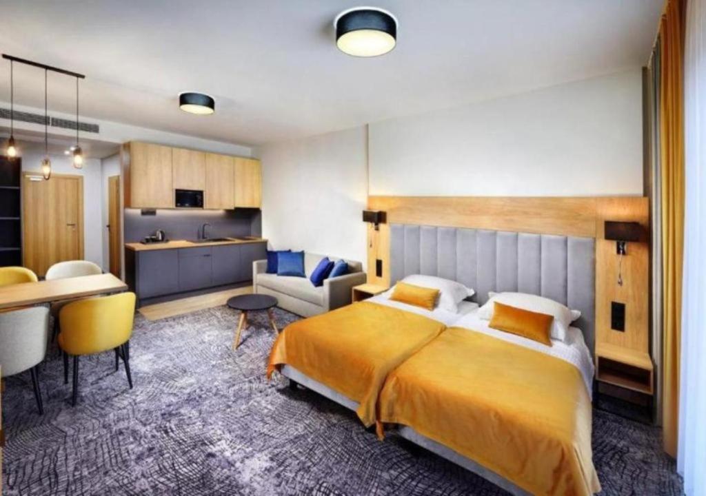 Postel nebo postele na pokoji v ubytování Hotel Akvamarín