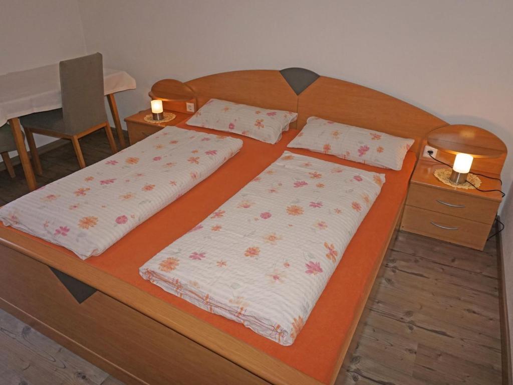 A bed or beds in a room at Apartment Haslwanter by Interhome