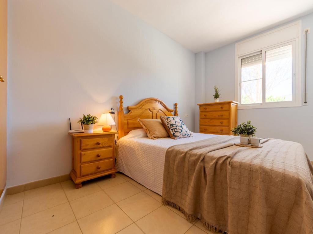 Postel nebo postele na pokoji v ubytování Apartment Res Mediterraneo-5 by Interhome