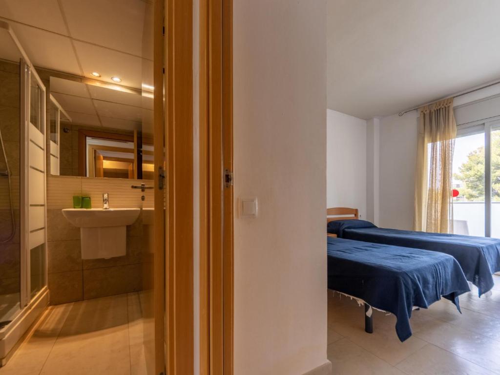 Posteľ alebo postele v izbe v ubytovaní Apartment Aquaria 5 by Interhome