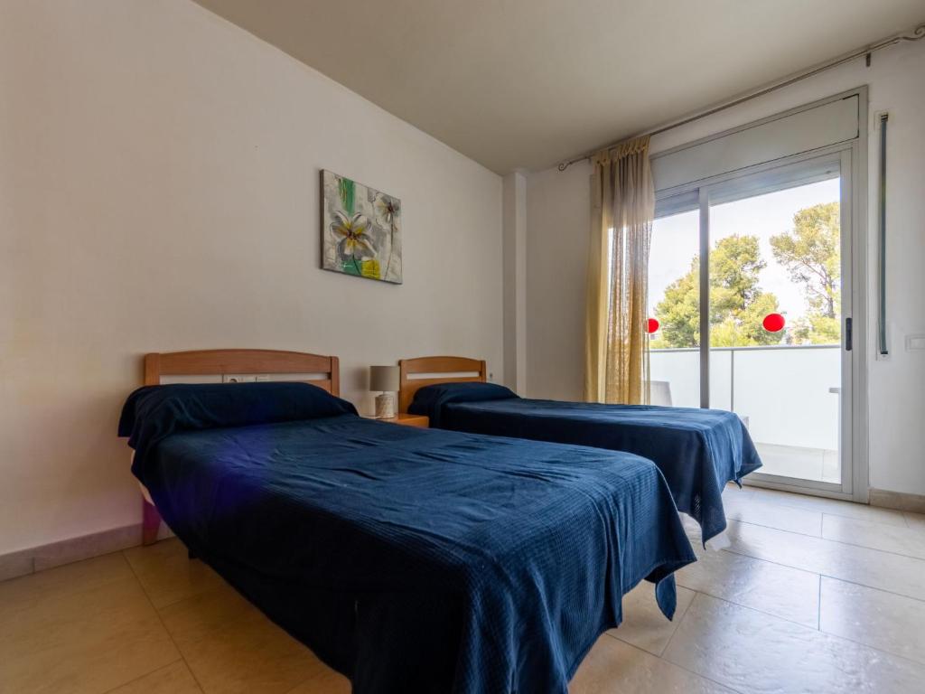 Posteľ alebo postele v izbe v ubytovaní Apartment Aquaria 5 by Interhome