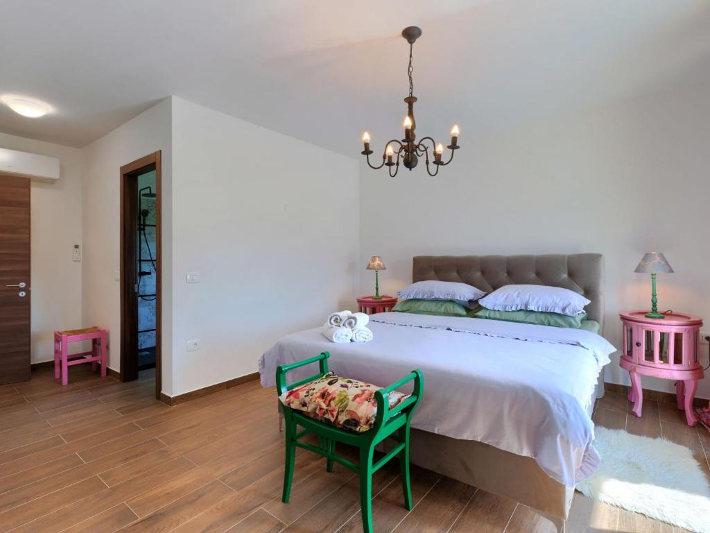Postel nebo postele na pokoji v ubytování Holiday Home Gasparini by Interhome