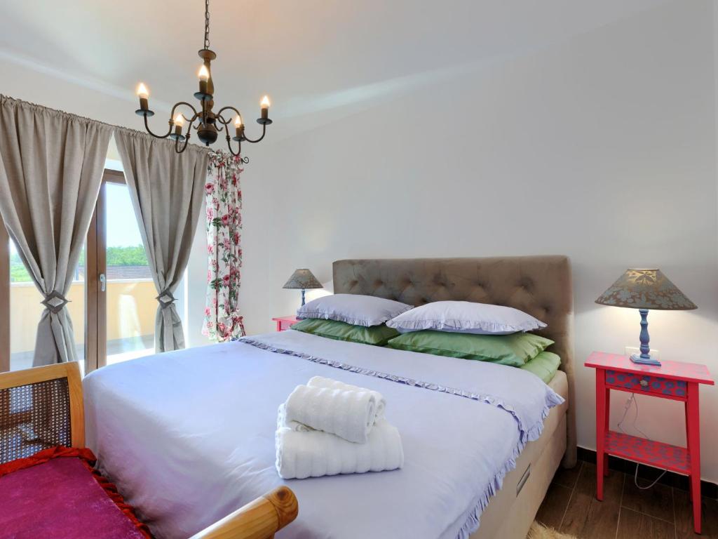 Postel nebo postele na pokoji v ubytování Holiday Home Gasparini by Interhome