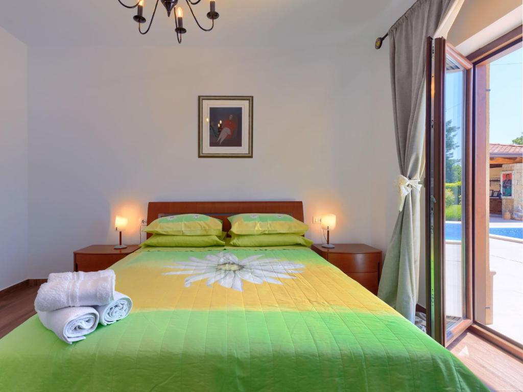 Postel nebo postele na pokoji v ubytování Holiday Home Gasparini by Interhome