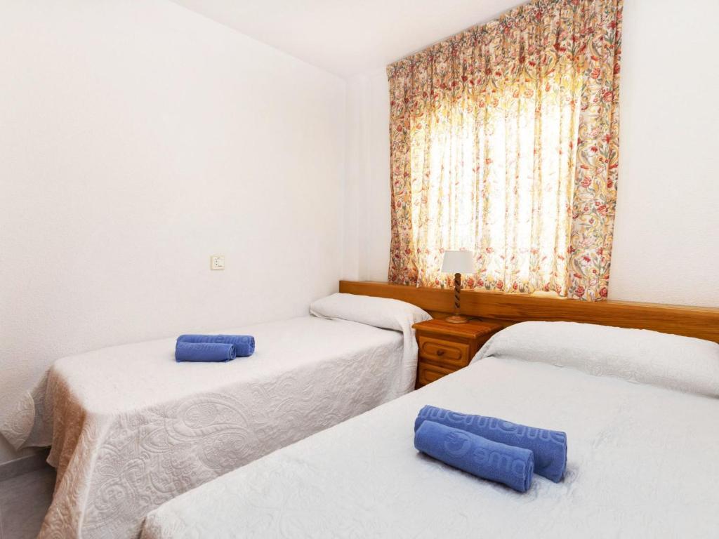 Postel nebo postele na pokoji v ubytování Apartment AT Sorolla II by Interhome