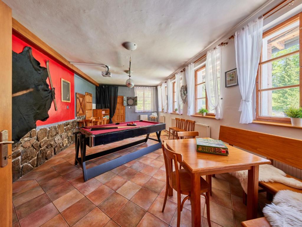 Postel nebo postele na pokoji v ubytování Chalet Krakonoš by Interhome