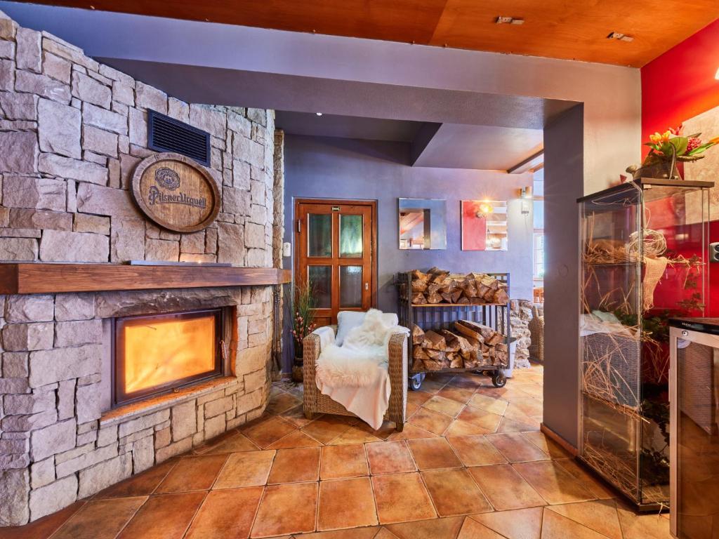 Postel nebo postele na pokoji v ubytování Chalet Krakonoš by Interhome