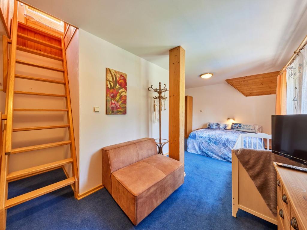 Postel nebo postele na pokoji v ubytování Chalet Krakonoš by Interhome