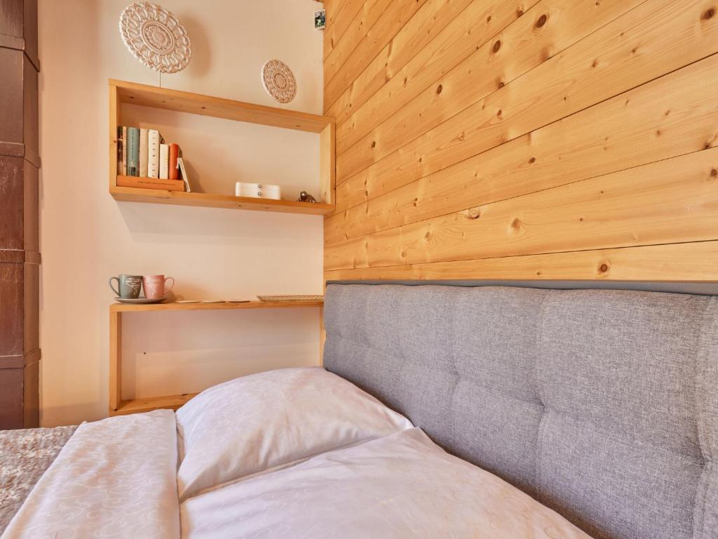 Postel nebo postele na pokoji v ubytování Chalet Krakonoš by Interhome