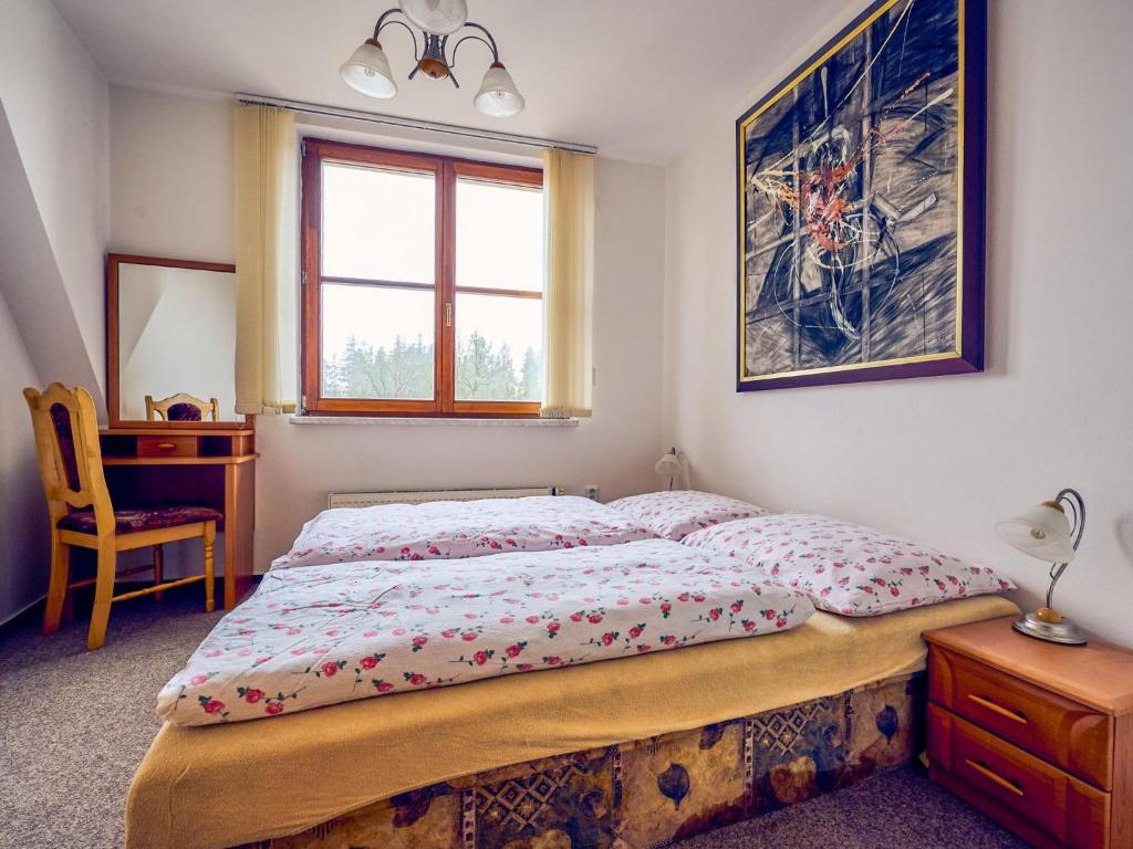 Llit o llits en una habitació de Apartment Harrachov 611-3 by Interhome