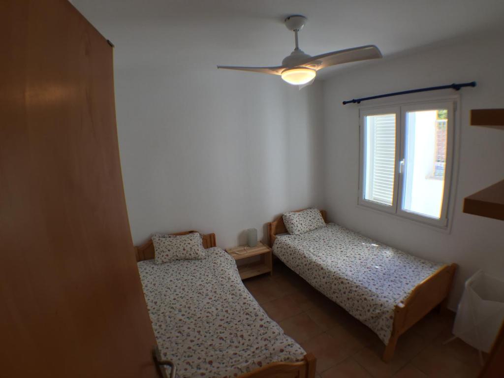 Postel nebo postele na pokoji v ubytování TRANQUILA Y AMPLIA CASA en CONIL