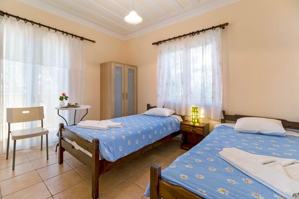 Postel nebo postele na pokoji v ubytování Villa Captain Fotis 2