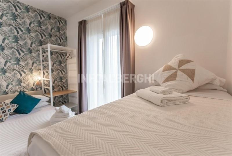 Postel nebo postele na pokoji v ubytování Albergo Aquila