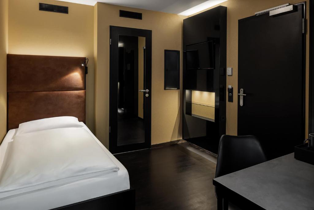 Postel nebo postele na pokoji v ubytování Hotel ZOE by AMANO