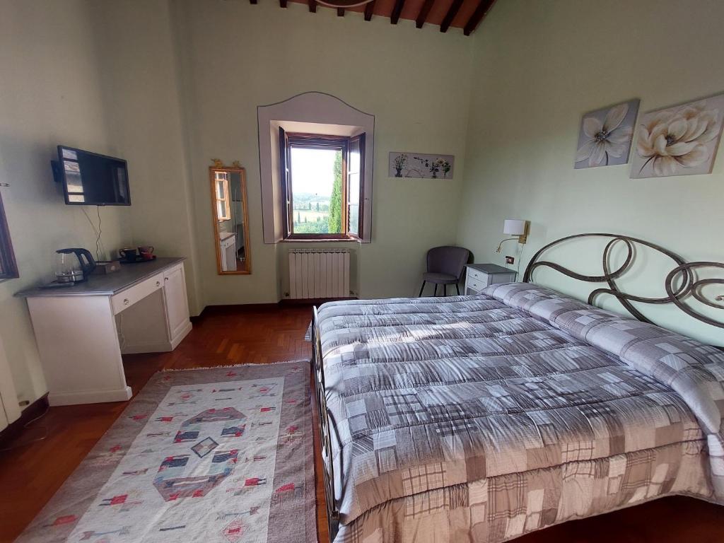 Postel nebo postele na pokoji v ubytování Podere Cacchini