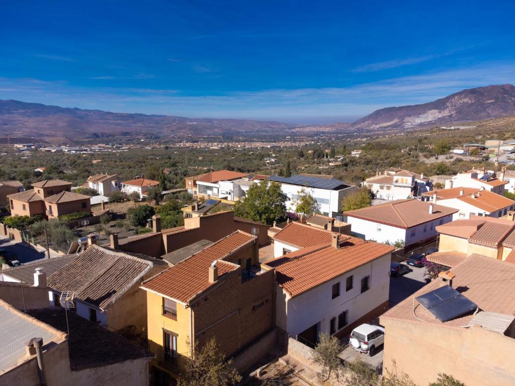 an aerial view of a small town with houses at Holiday Home Elvira by Interhome in Nigüelas
