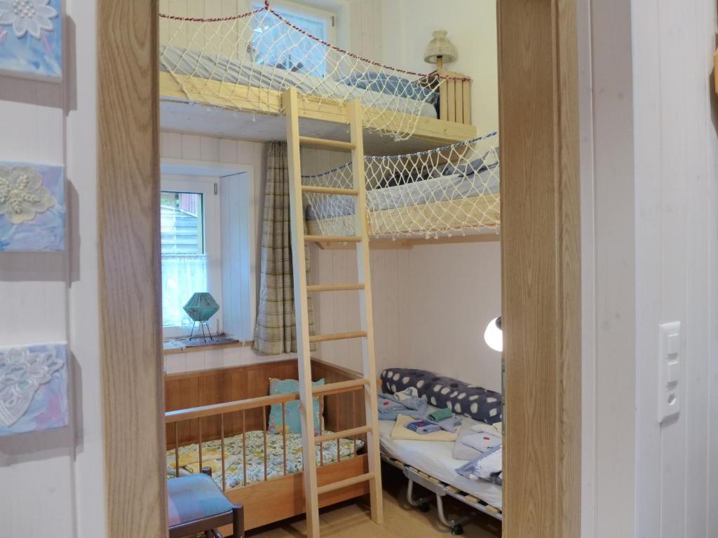 Postel nebo postele na pokoji v ubytování Apartment Beim Thor by Interhome