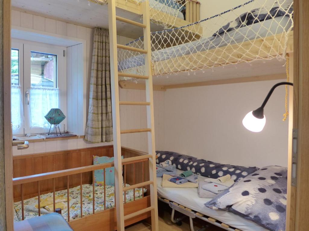 Postel nebo postele na pokoji v ubytování Apartment Beim Thor by Interhome