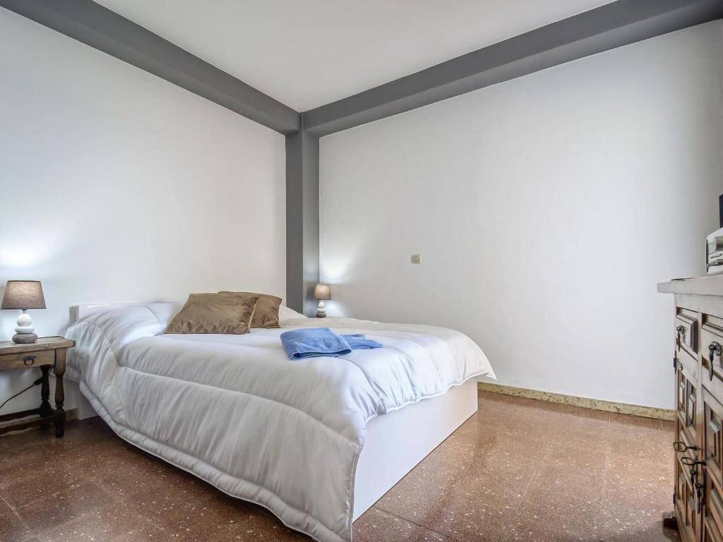 Posteľ alebo postele v izbe v ubytovaní Apartment Blaumar by Interhome