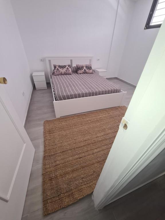 A bed or beds in a room at summerland beach