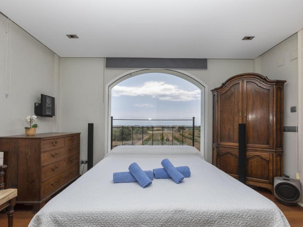 Postel nebo postele na pokoji v ubytování Villa Finca Villa Roig by Interhome