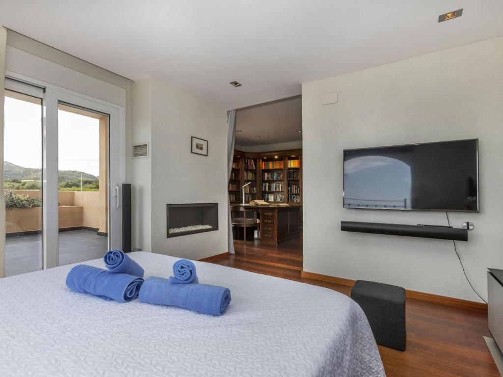 Postel nebo postele na pokoji v ubytování Villa Finca Villa Roig by Interhome