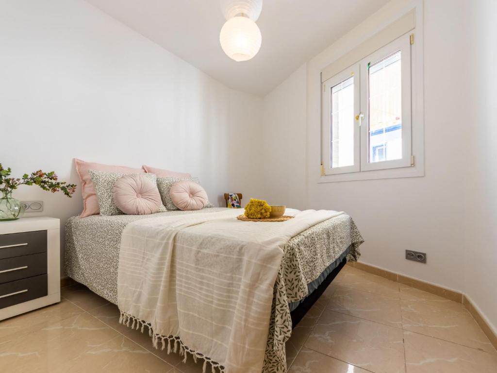 Posteľ alebo postele v izbe v ubytovaní Apartment Narcis by Interhome