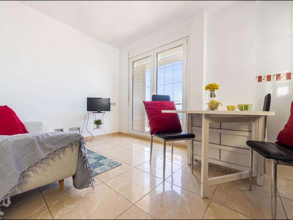 Televízia a/alebo spoločenská miestnosť v ubytovaní Apartment Narcis by Interhome