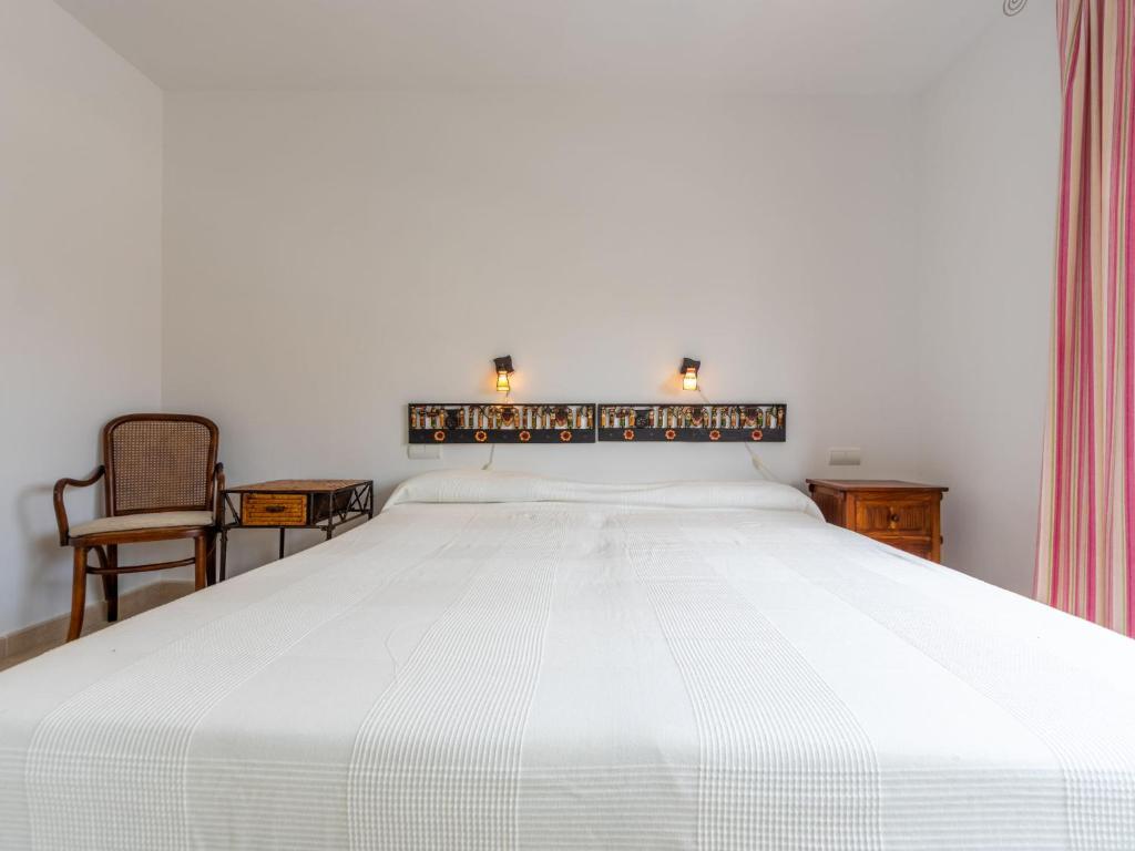 Posteľ alebo postele v izbe v ubytovaní Holiday Home Reig by Interhome