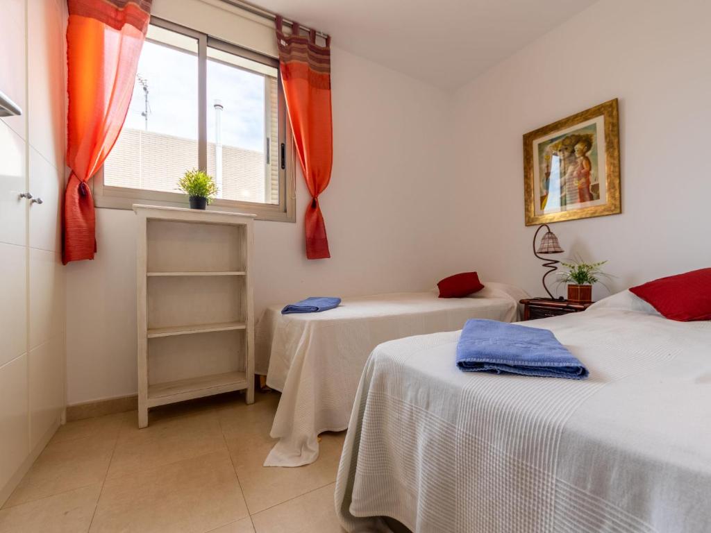 Posteľ alebo postele v izbe v ubytovaní Holiday Home Reig by Interhome