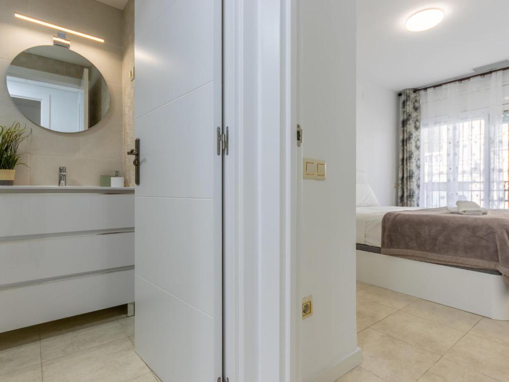 Postel nebo postele na pokoji v ubytování Apartment Dumitru by Interhome