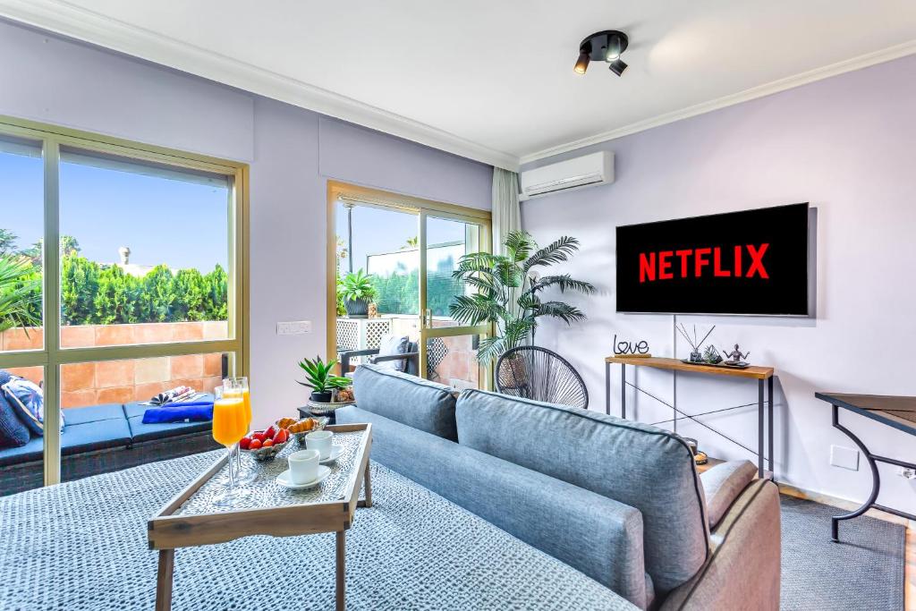TV a/nebo společenská místnost v ubytování Super2beachfront