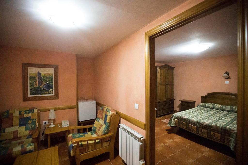 Posteľ alebo postele v izbe v ubytovaní Hotel Rural Ocell Francolí
