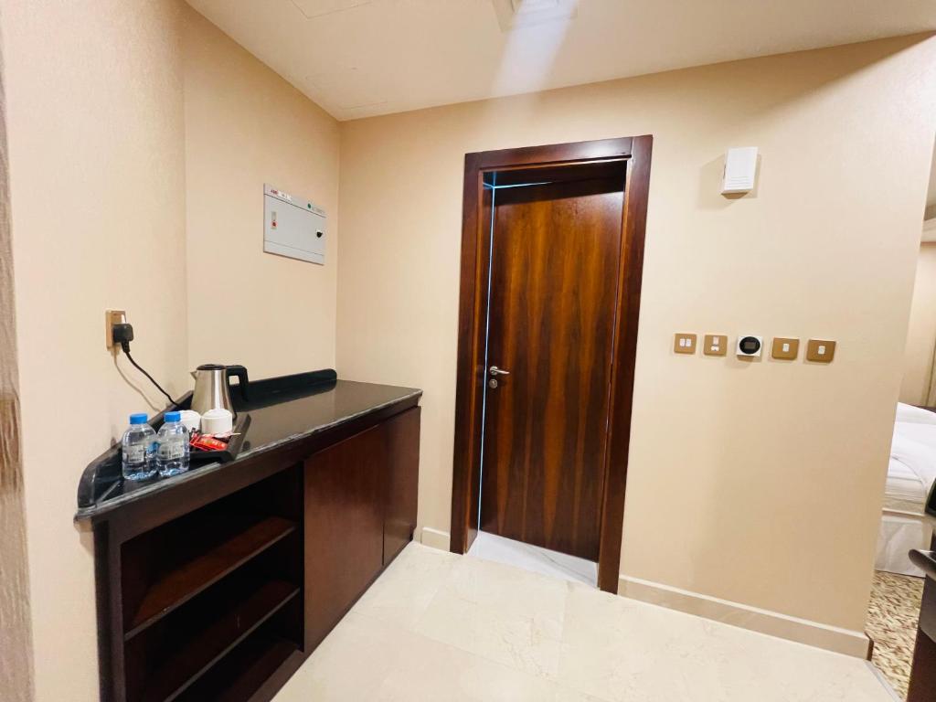 Kuchyň nebo kuchyňský kout v ubytování Grand Legacy Hotel Doha