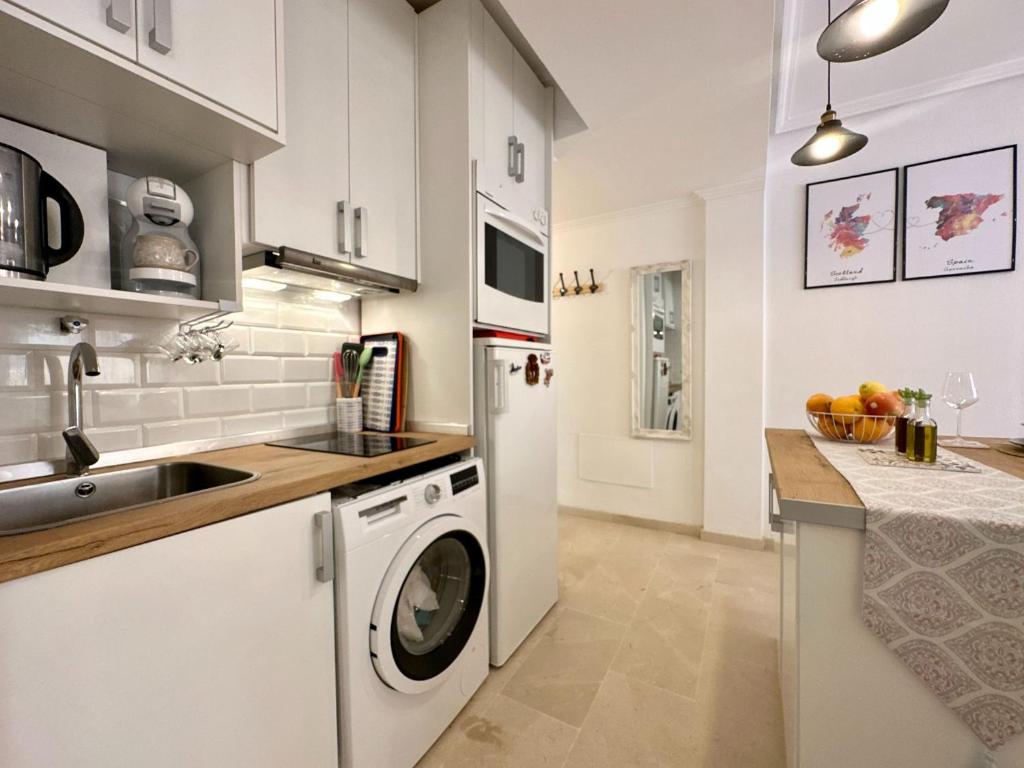 Kuchyň nebo kuchyňský kout v ubytování Casa Playa de Garrucha