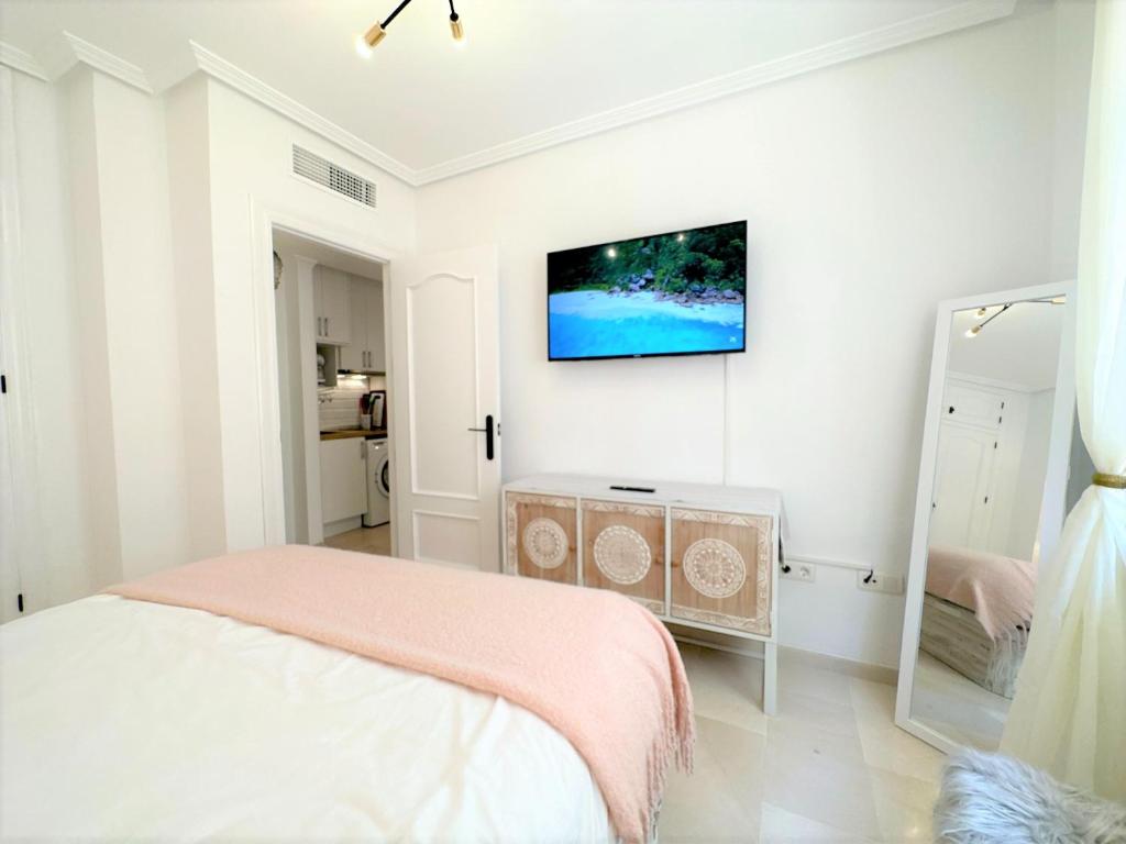TV a/nebo společenská místnost v ubytování Casa Playa de Garrucha