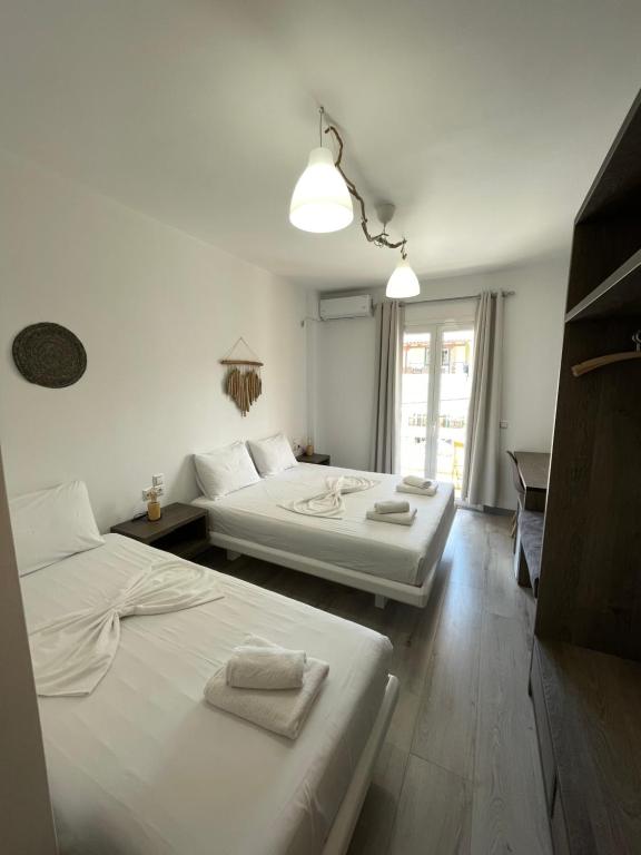 Postel nebo postele na pokoji v ubytování Orchard Retreat