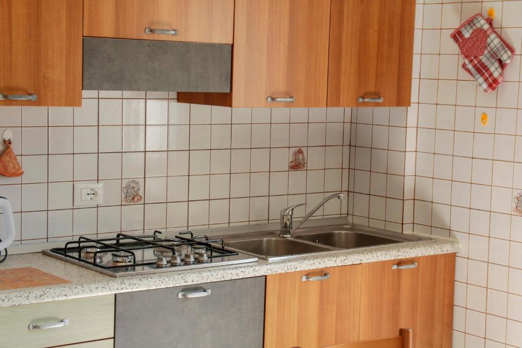 Kuchyňa alebo kuchynka v ubytovaní Appartamento l'edera