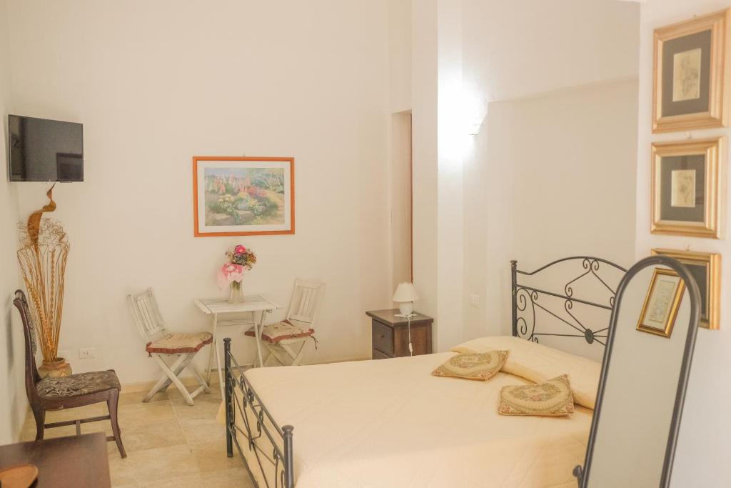 Кровать или кровати в номере B&B Tenuta Martinelli