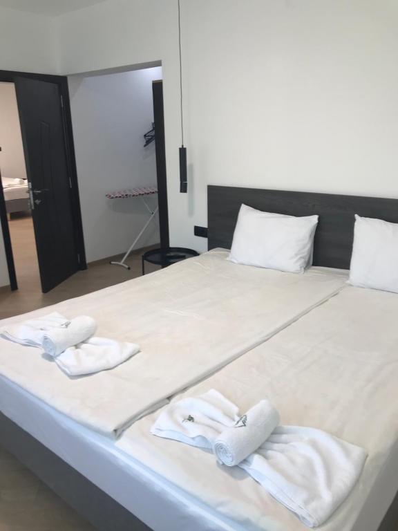 Postel nebo postele na pokoji v ubytování SPA Apartments Perun