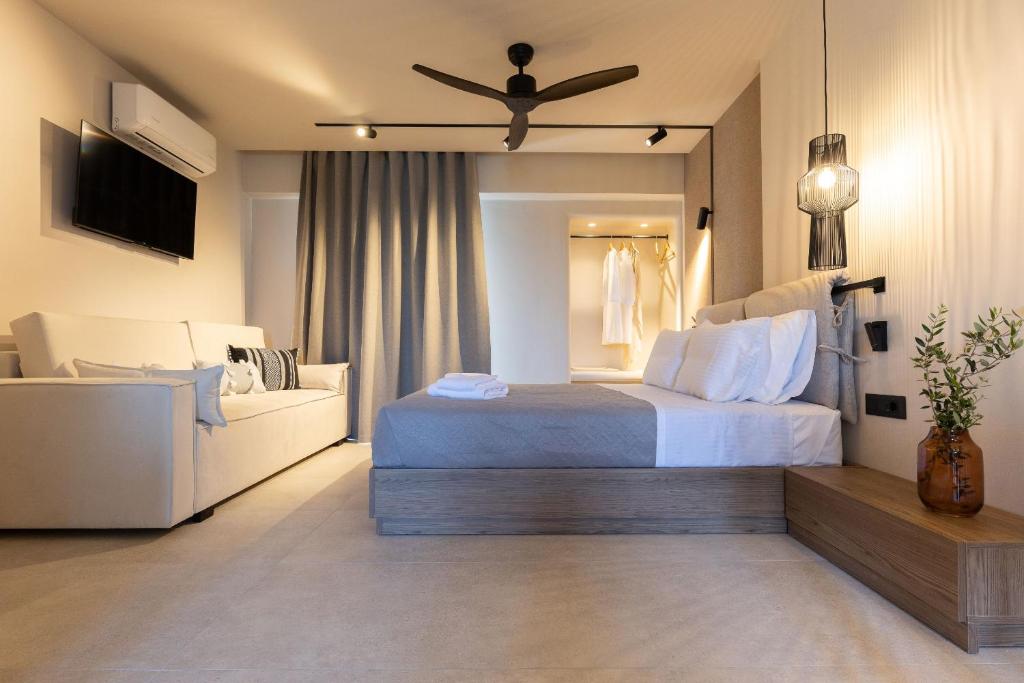 Postel nebo postele na pokoji v ubytování Niro Beachfront Living
