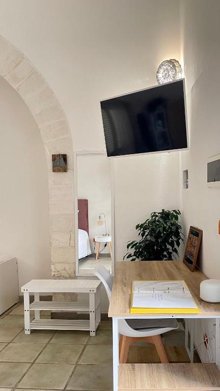 Telewizja i/lub zestaw kina domowego w obiekcie Il Giardino dei Limoni