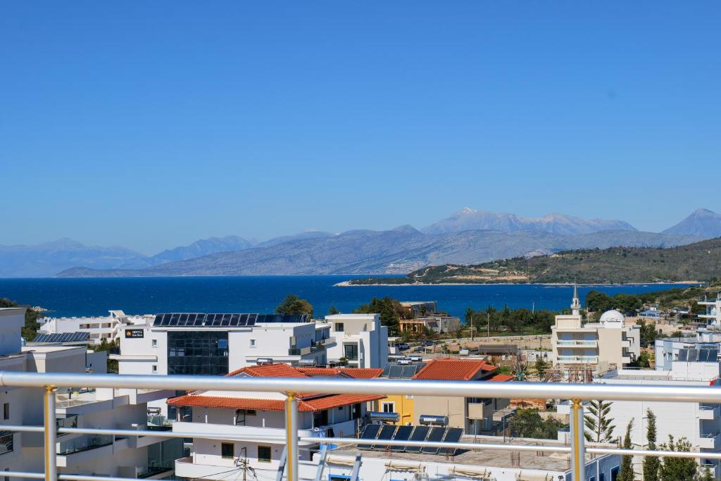 a view of the city and the water at Hotel Milo Ksamil in Ksamil