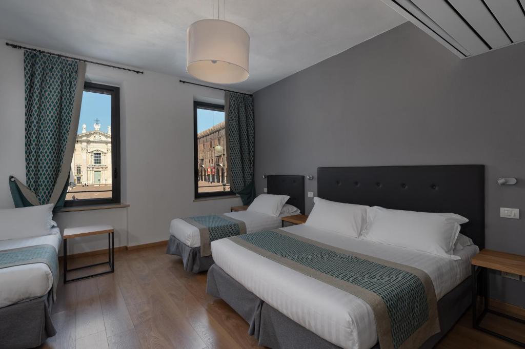Postel nebo postele na pokoji v ubytování Hotel dei Gonzaga