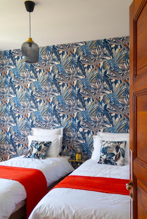 Maison et table d'hôtes Le Camélia Blanc - Quadruple Chambre