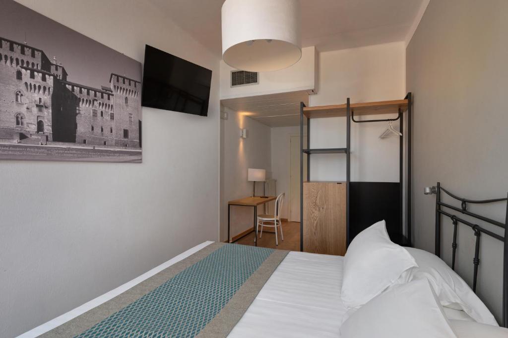 Postel nebo postele na pokoji v ubytování Hotel dei Gonzaga