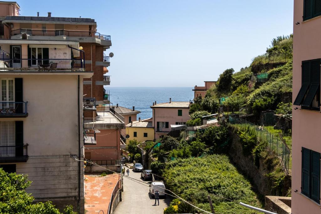 a view of the ocean from an apartment building at La Casa di Madi in Riomaggiore