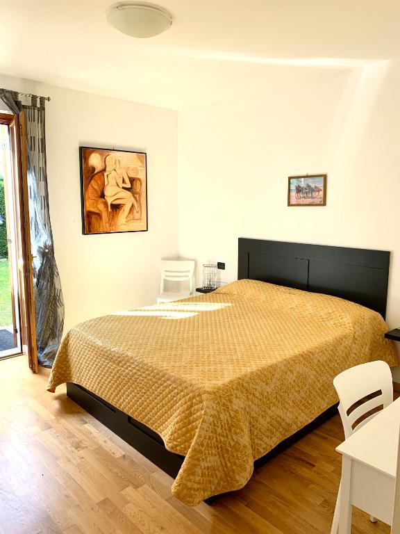 A bed or beds in a room at Casa Alice